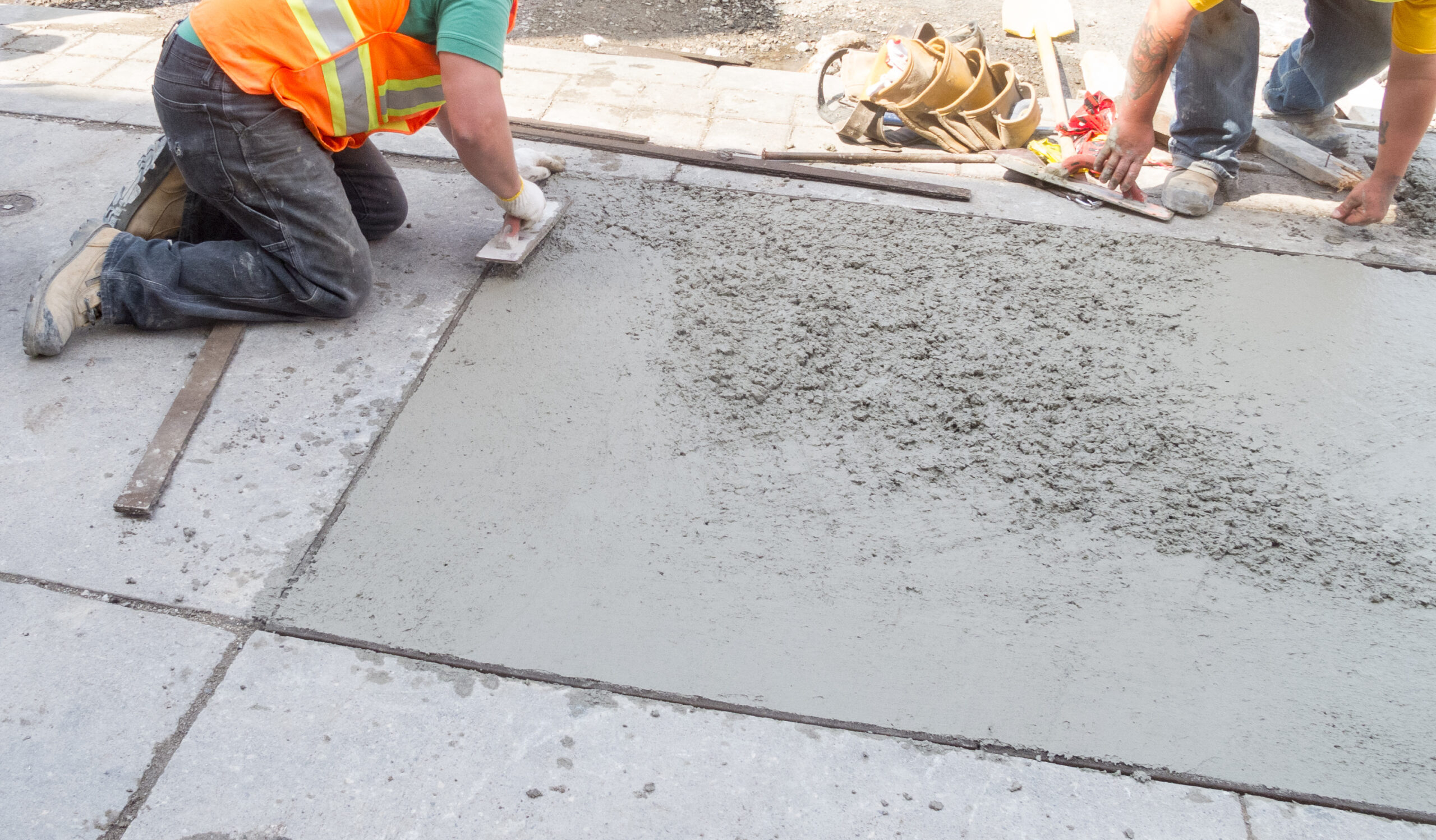 Laying down new pavement in residential neighborhood